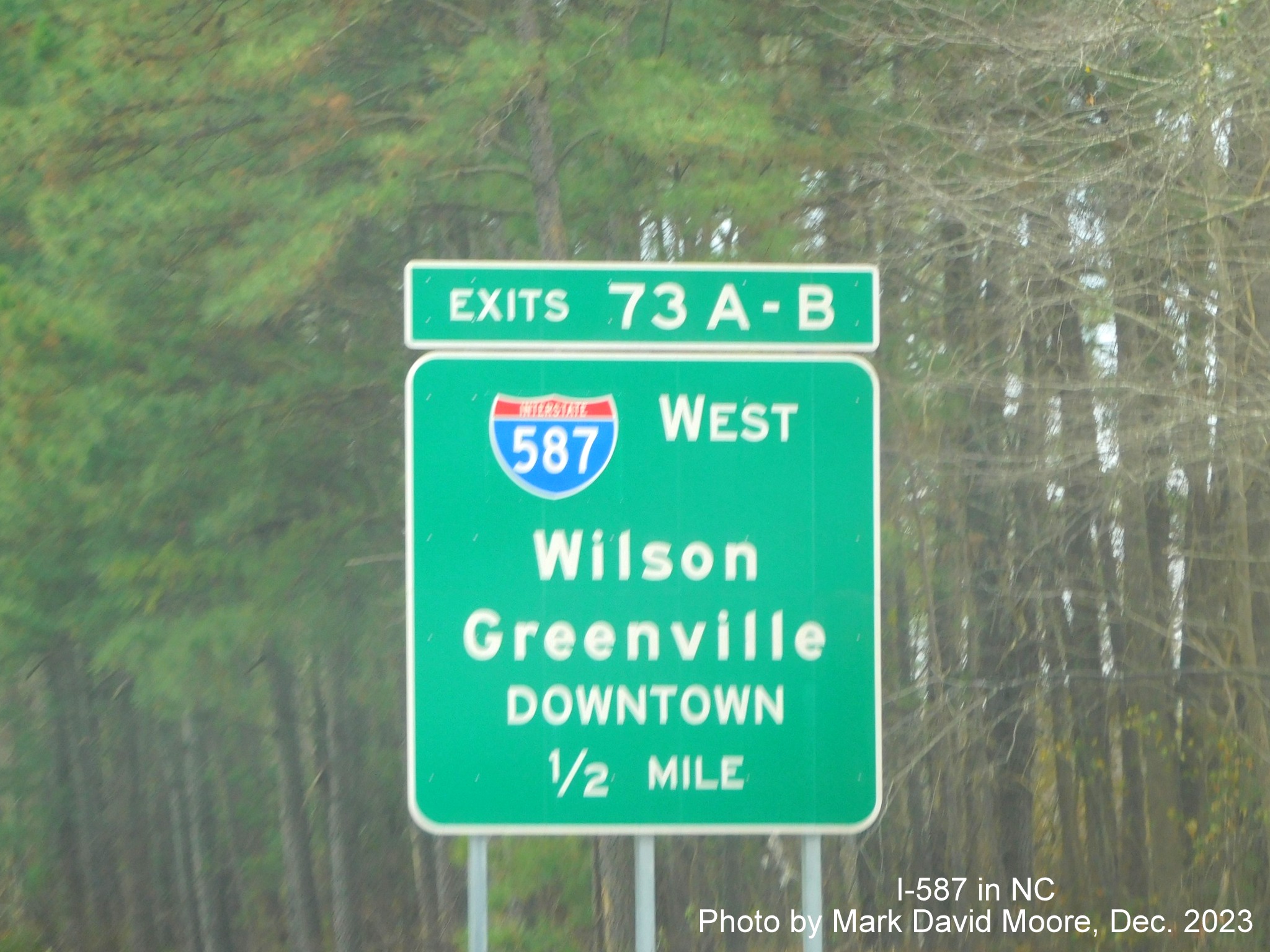 Image of ground mounted 1/2 mile advance sign for I-587 West exit on US 264 East/NC 11 Bypass South in Greenville, photo by Mark David Moore, December 2022