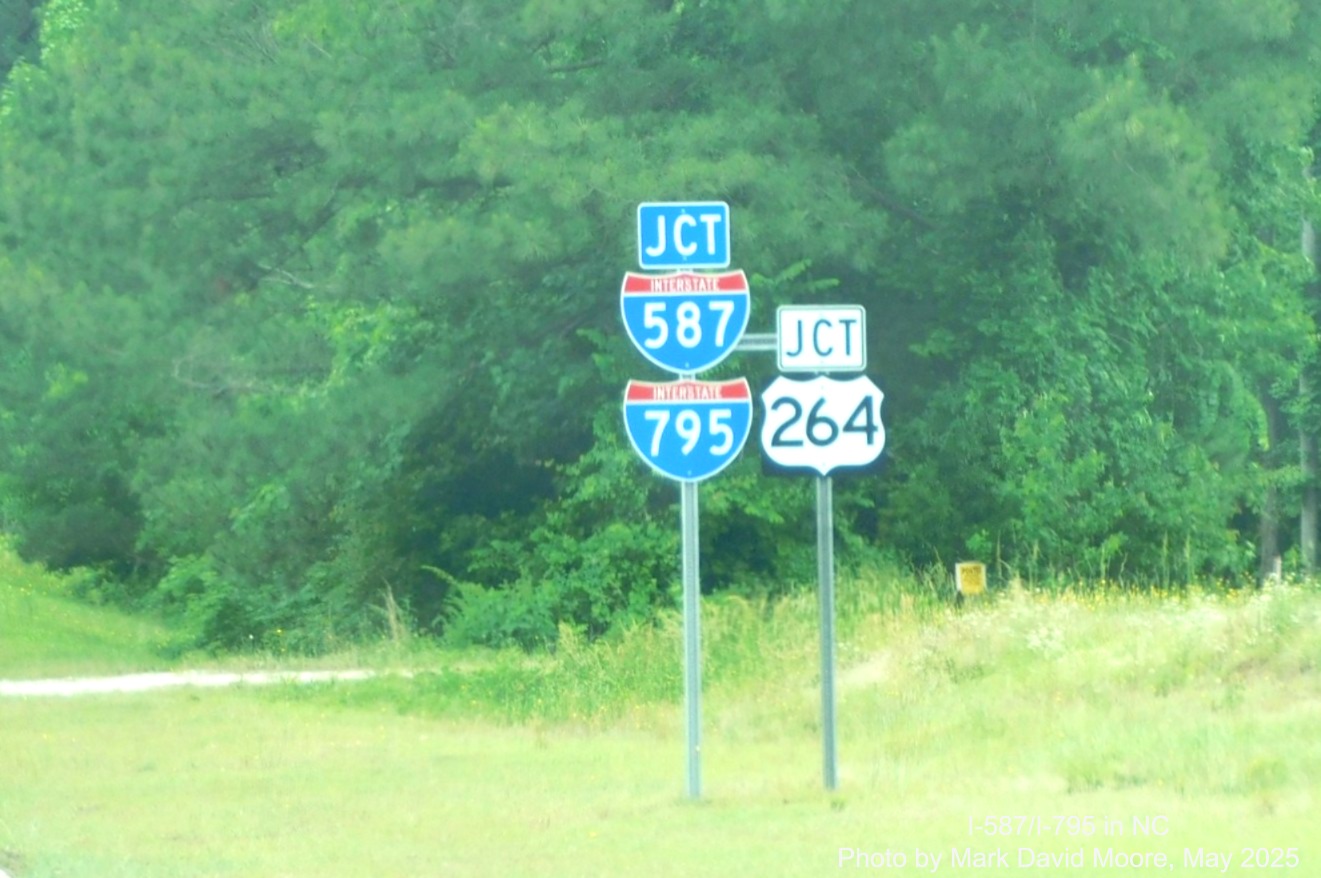 Image of I-587, I-795 and US 264 signage at NC 42 exit in Wilson, 
	by Mark David Moore, May 2025