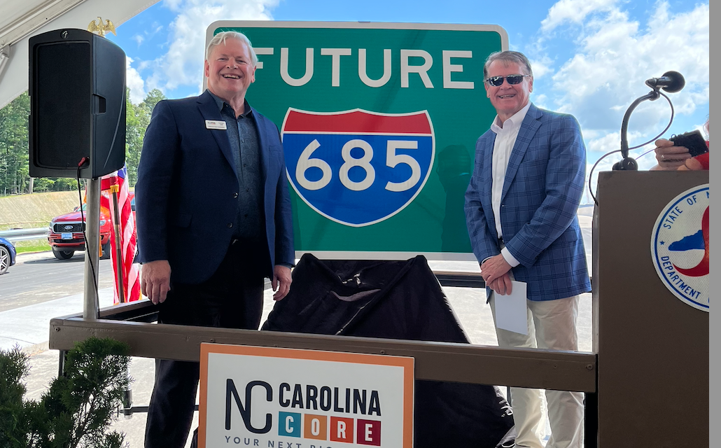 Image of new Future I-685 sign being displayed
at NC Core event on US 421 in Julian, May 2024