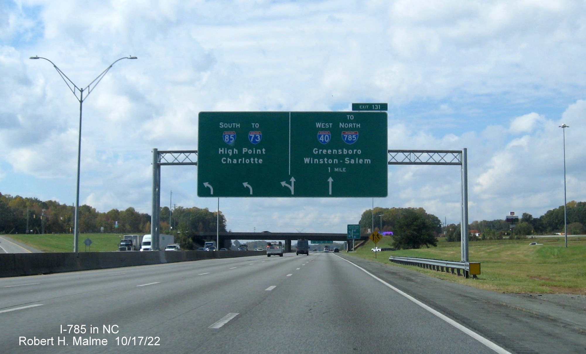Image of I-785 shield on advance arrow-per-lane sign at split of I-85 South and I-40 West east of Greensboro, October 2022