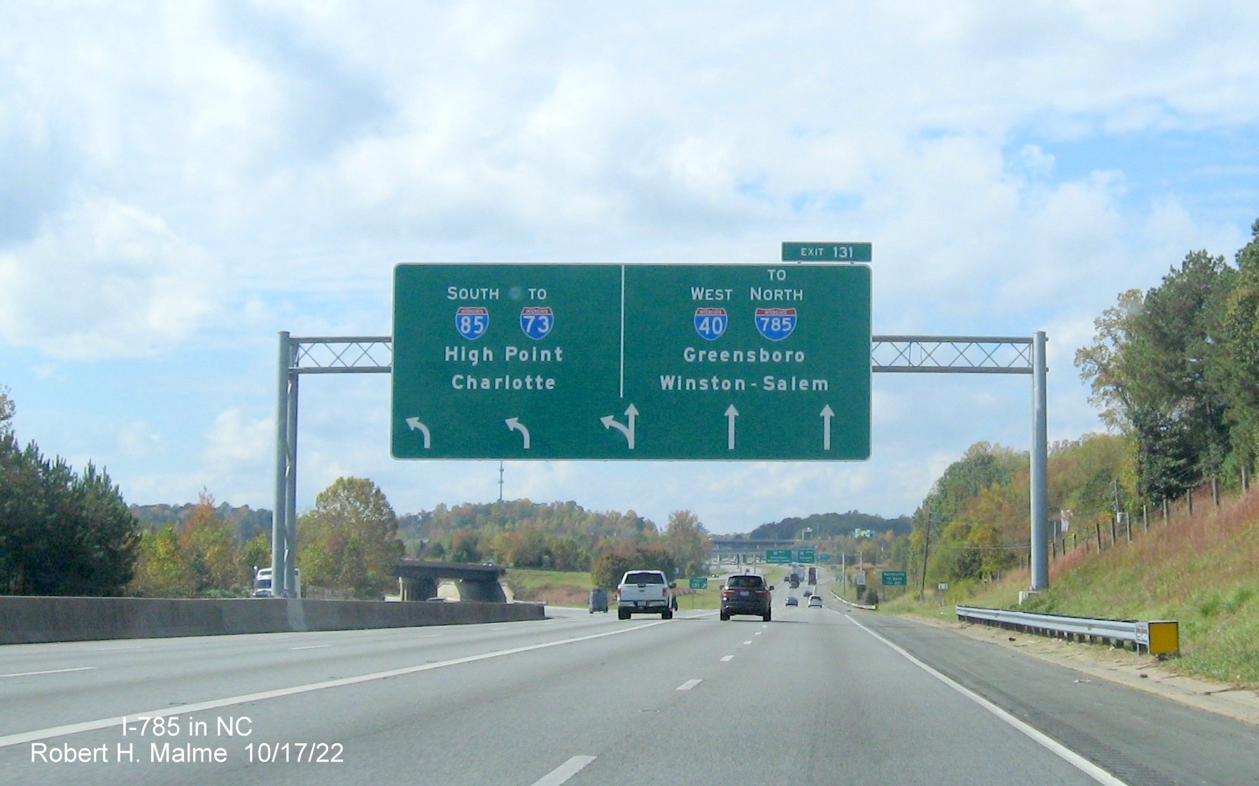 Image of I-785 shield on advance arrow-per-lane sign at split of I-85 South and I-40 West east of Greensboro, October 2022