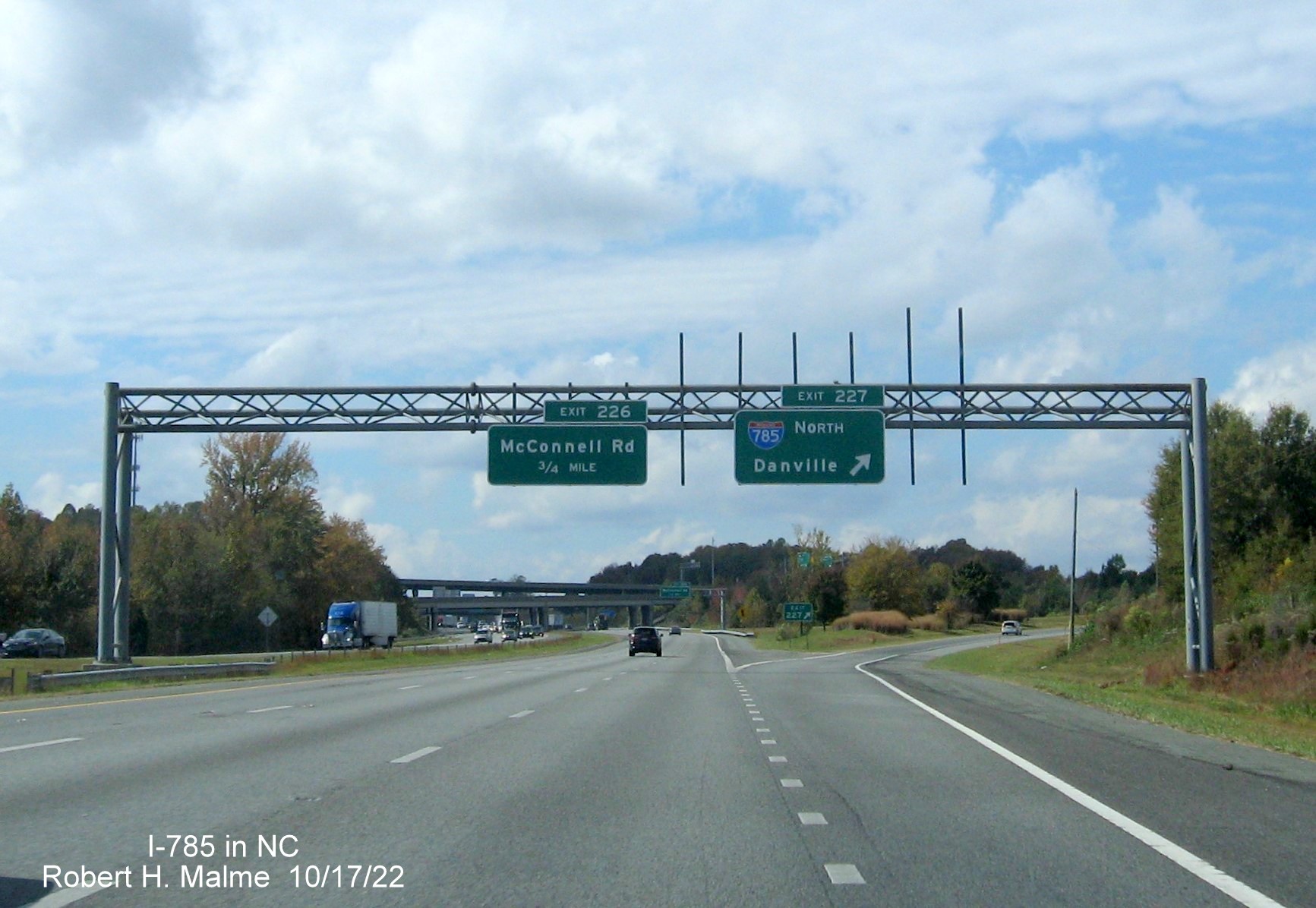 Image of I-785 shield on advance arrow-per-lane sign at split of I-85 South and I-40 West east of Greensboro, October 2022