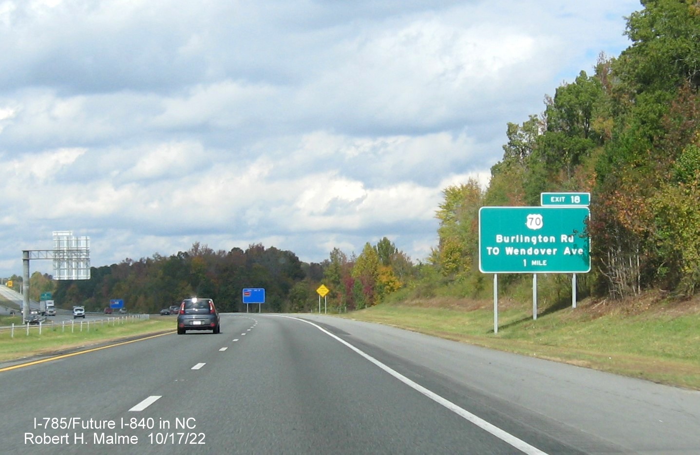 Image of 1 mile advance sign for US 70/Burlington Road exit on I-795 North/Future I-840 West Greensboro 
                  Urban Loop, October 2022