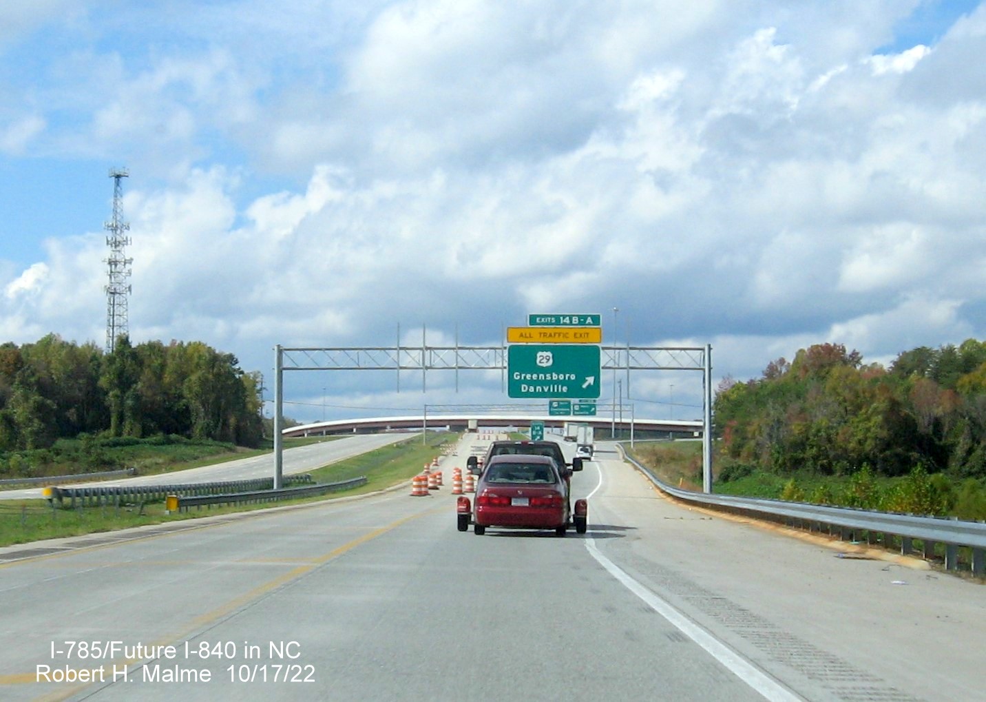 Image of overhead C/D ramp sign for US 29 (Future I-785 North) exit on Greensboro 
                  Urban Loop, October 2022