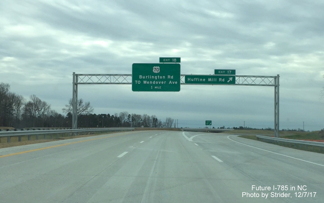 Image of overhead signage at off-ramp to Huffine Mill Rd on I-785/Greensboro Loop South, by Strider