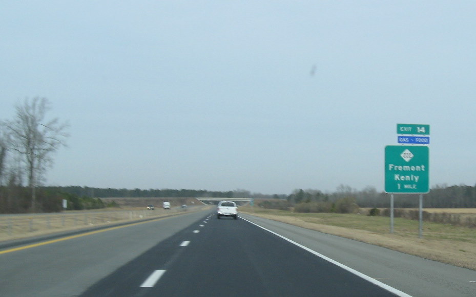 Photo of NC 222 exit signage off of I-795 South showing new Exit number, Jan. 
          2010
