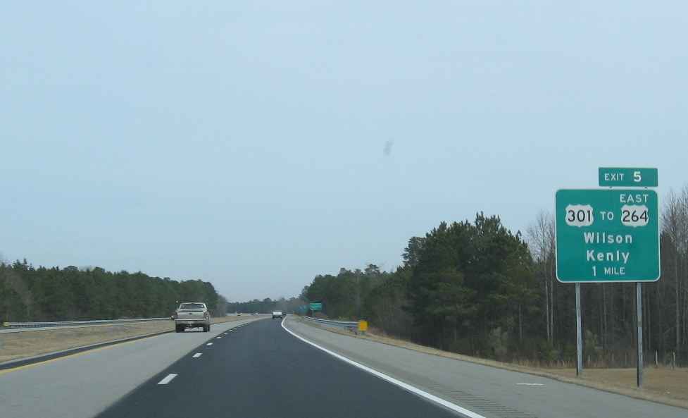 Photo of exit signage for the last exit on the former US 117 portion of I-795, 
          Jan. 2010