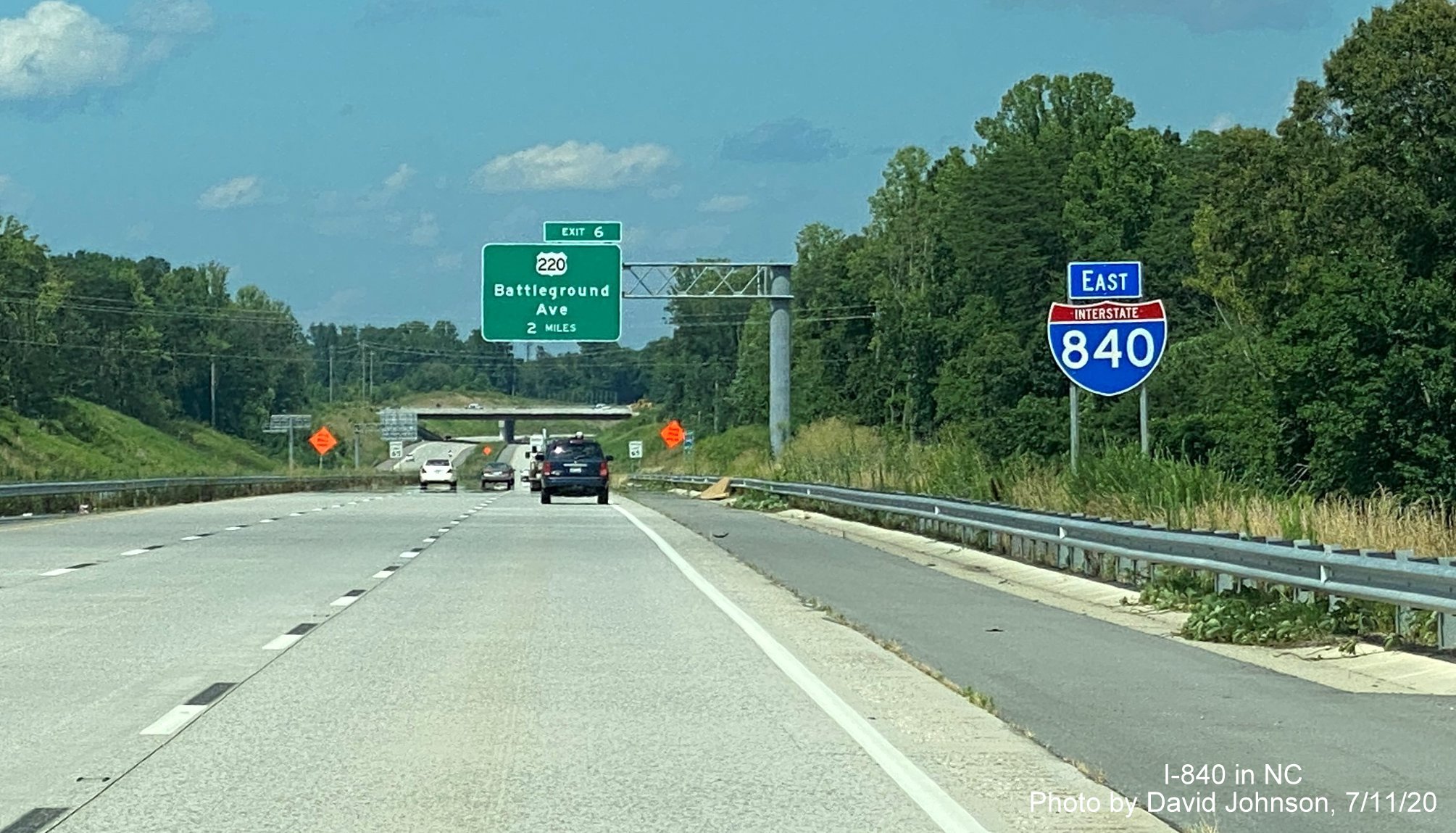 Image of East I-840 reassurance marker and 2-miles advance sign for US 220 exit on I-840 Greensboro Loop, by David Johnson July 2020