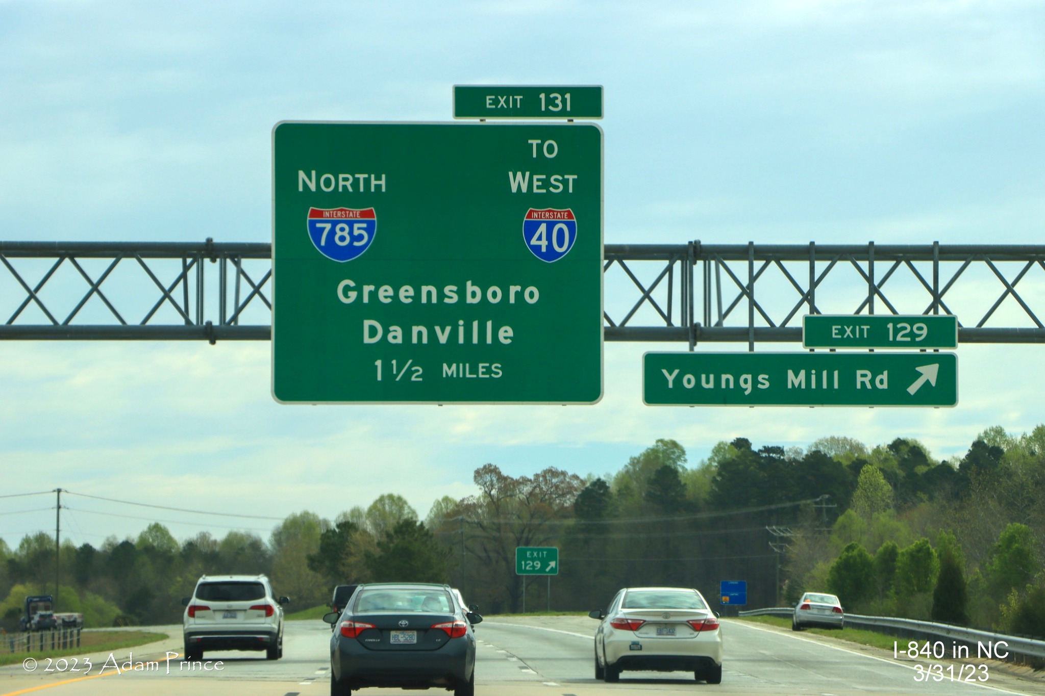 Image of overhead 1 1/2 mile advance sign for northern section of Greensboro Loop on I-85 North still missing 
                                              I-840 shield, Adam Prince,  March 2023