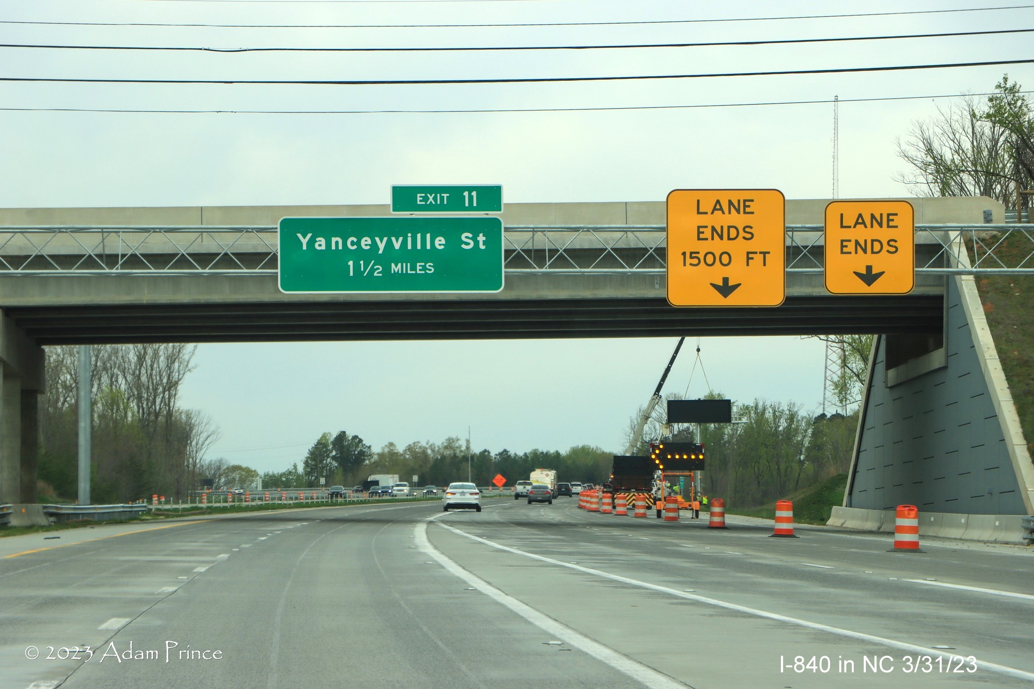 Image of continues sign installation work along the new section of Greensboro Loop, after the US 29
            exit on I-840 West, Adam Prince,  March 2023