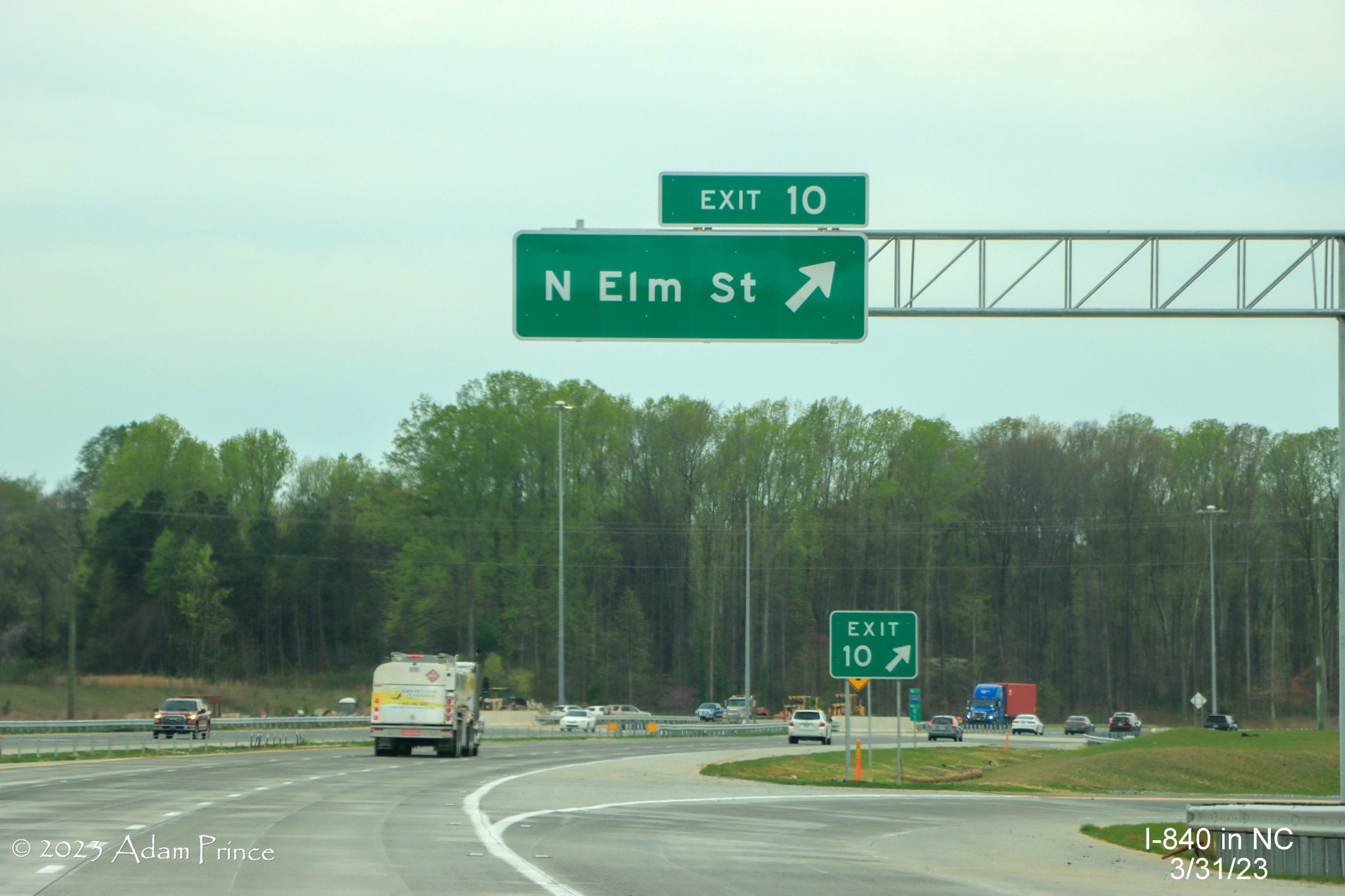 Image of overhead ramp sign for North Elm Street exit on I-840 West newest section of Greensboro 
             Loop, Adam Prince,  March 2023