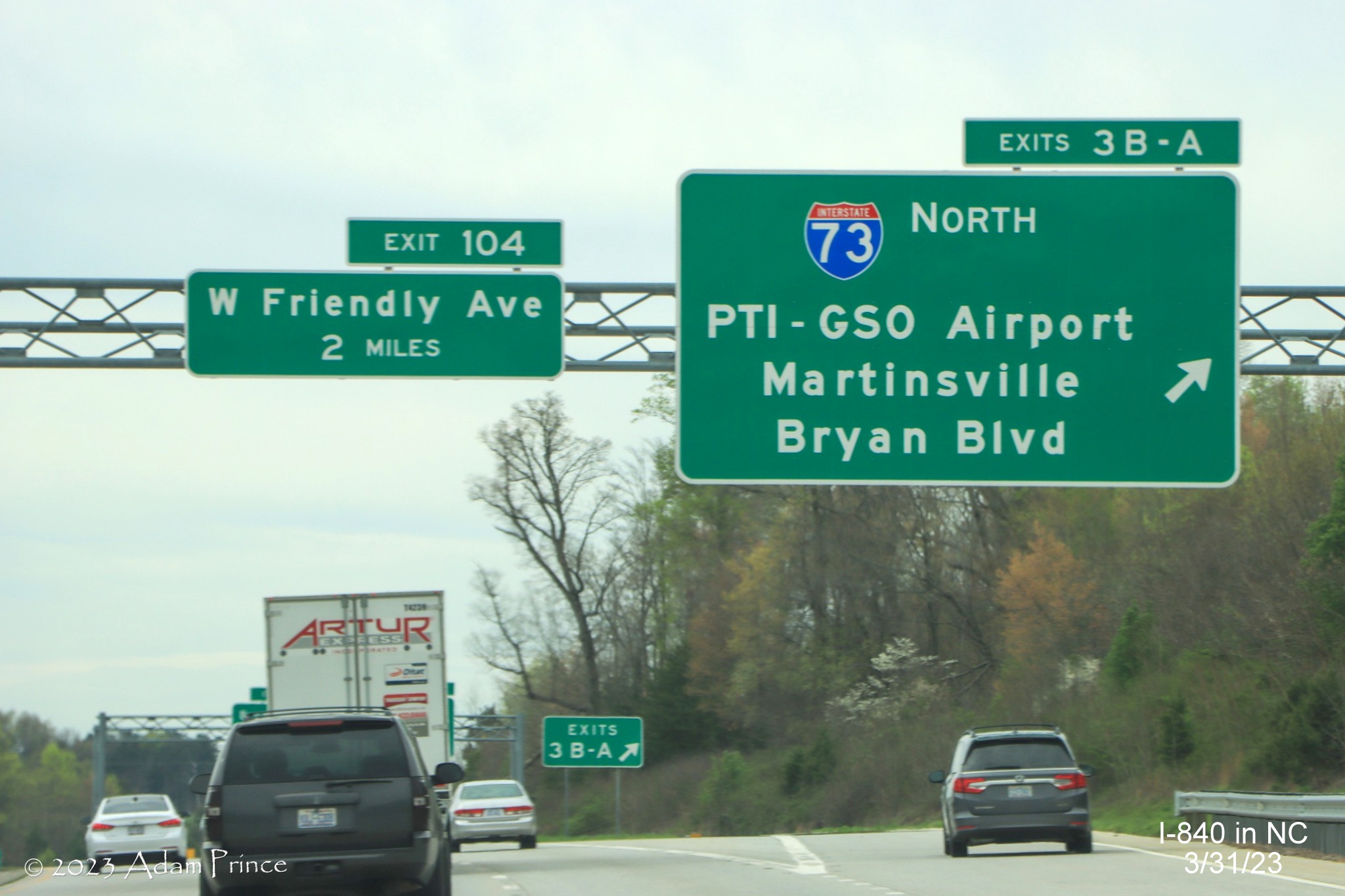 Image of overhead ramp sign for I-73/Bryan Blvd exit on I-840 West/Greensboro Loop, 
              Adam Prince,  March 2023