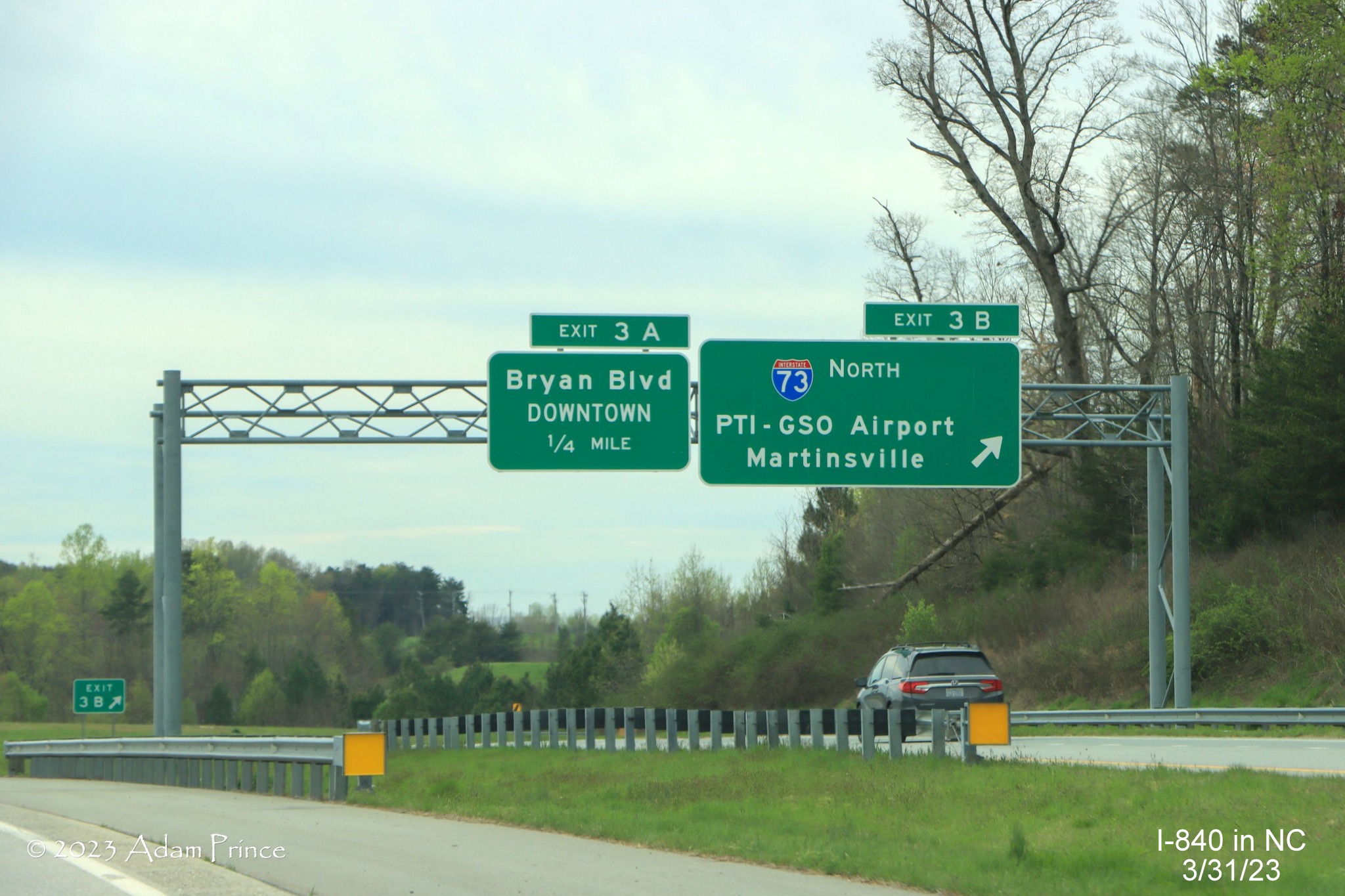 Image of overhead signs on C/D lanes for I-73/Bryan Blvd exit from I-840 West/Greensboro Loop, 
              Adam Prince,  March 2023