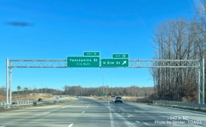 Image of overhead signage at former end of I-840 East/Greensboro Loop at North Elm Street, photo by Strider, January 2023