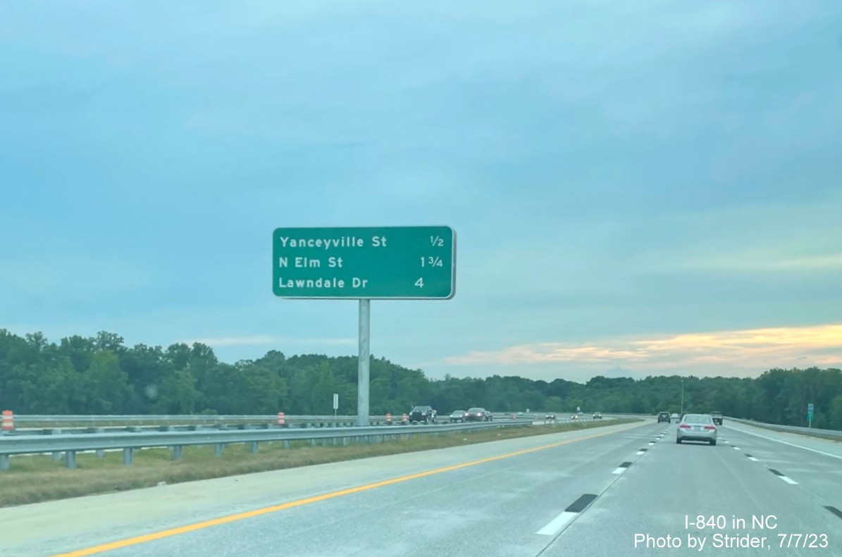Image of newly placed median post-interchange distance sign after the US 29 exits on I-840/Greensboro Loop West, photo by Strider, July 2023
