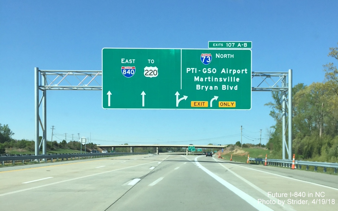 Image of overhead arrow-per-lane exit sign at split of I-73 North and new section of I-840 East/Greensboro Urban Loop, by Strider
