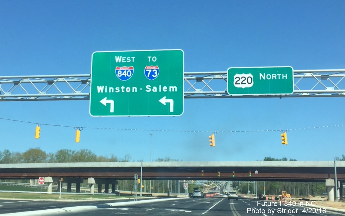 Image of overhead signage along US 220/Battleground Ave for newly opened segment of I-840 West/Greensboro Urban Loop, by Strider
