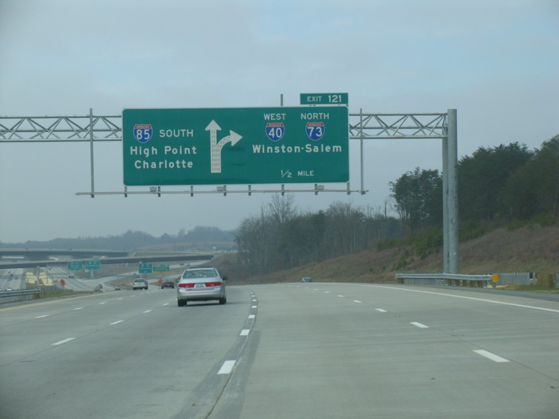 Image of overhead signage along then I-85/I-40 Greensboro Loop at I-73 exit in 2008, by Adam Prince