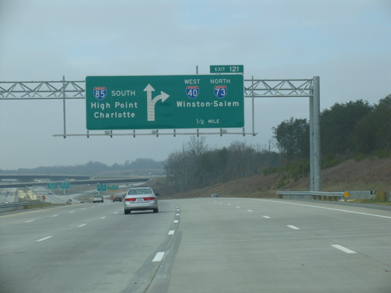 Image of overhead signage along then I-85/I-40 Greensboro Loop at I-73 exit in 2008, by Adam Prince