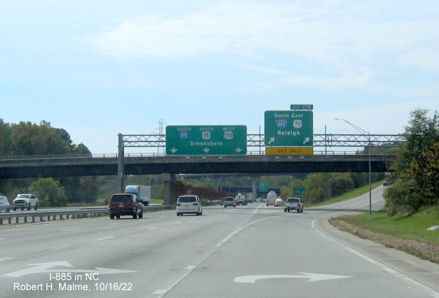 Image of overhead ramp sign for I-885 South/US 70 East exit on I-85/US 15 South in Durham, October 2022