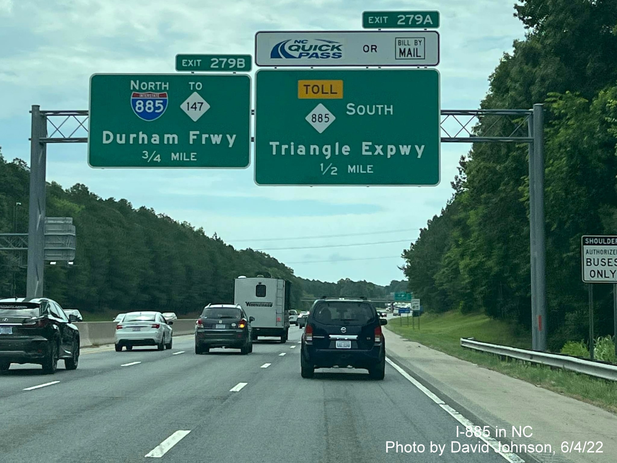 Image of new advance signage with I-885 and NC 885 shields for Durham Freeway and Triangle Expressway exits on I-40 East, by David Johnson, June 2022