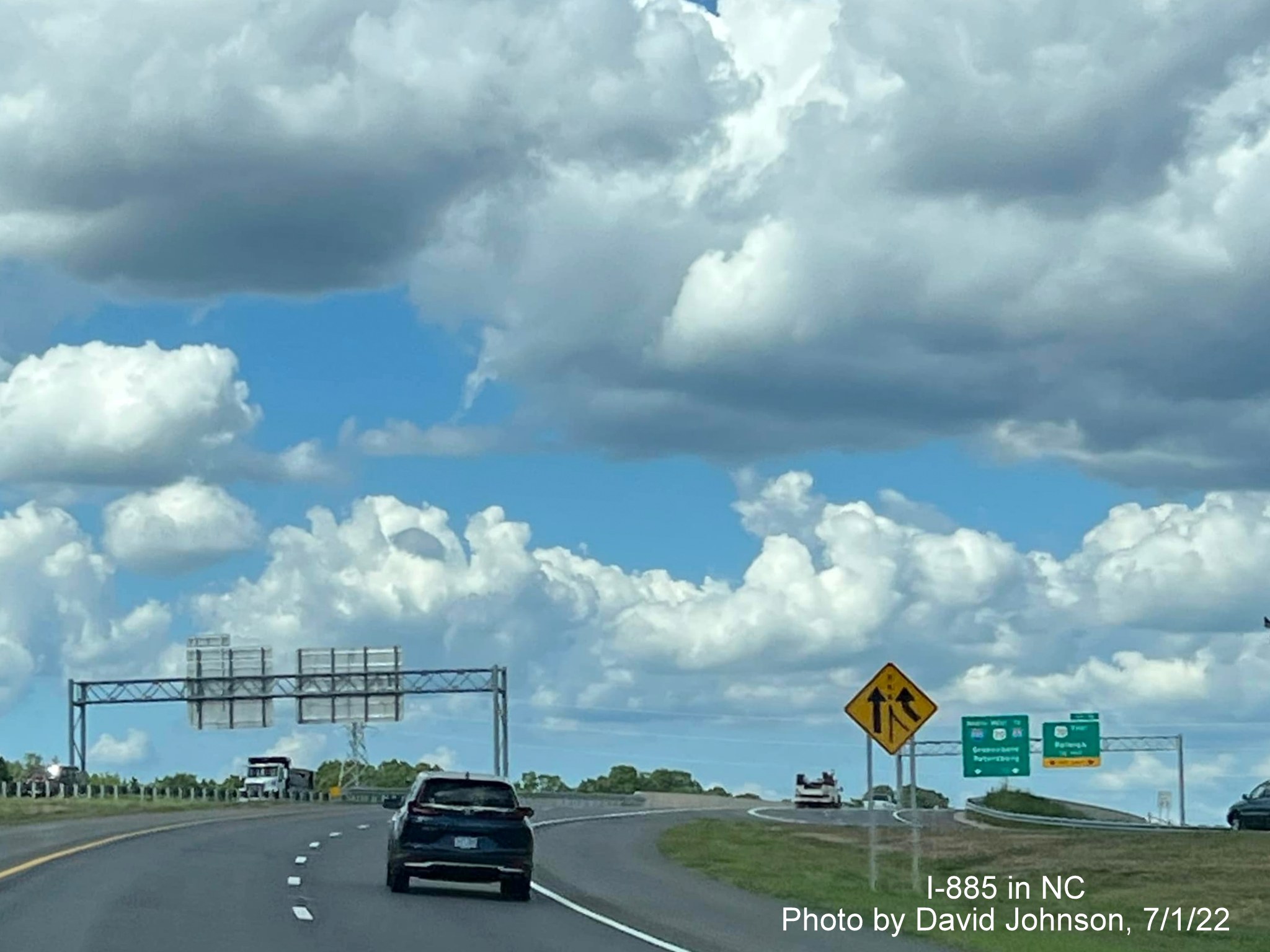 Image of traffic from opened NC 147 South ramp merging with I-885 North ramp on East End Connector, by David Johnson July 2022