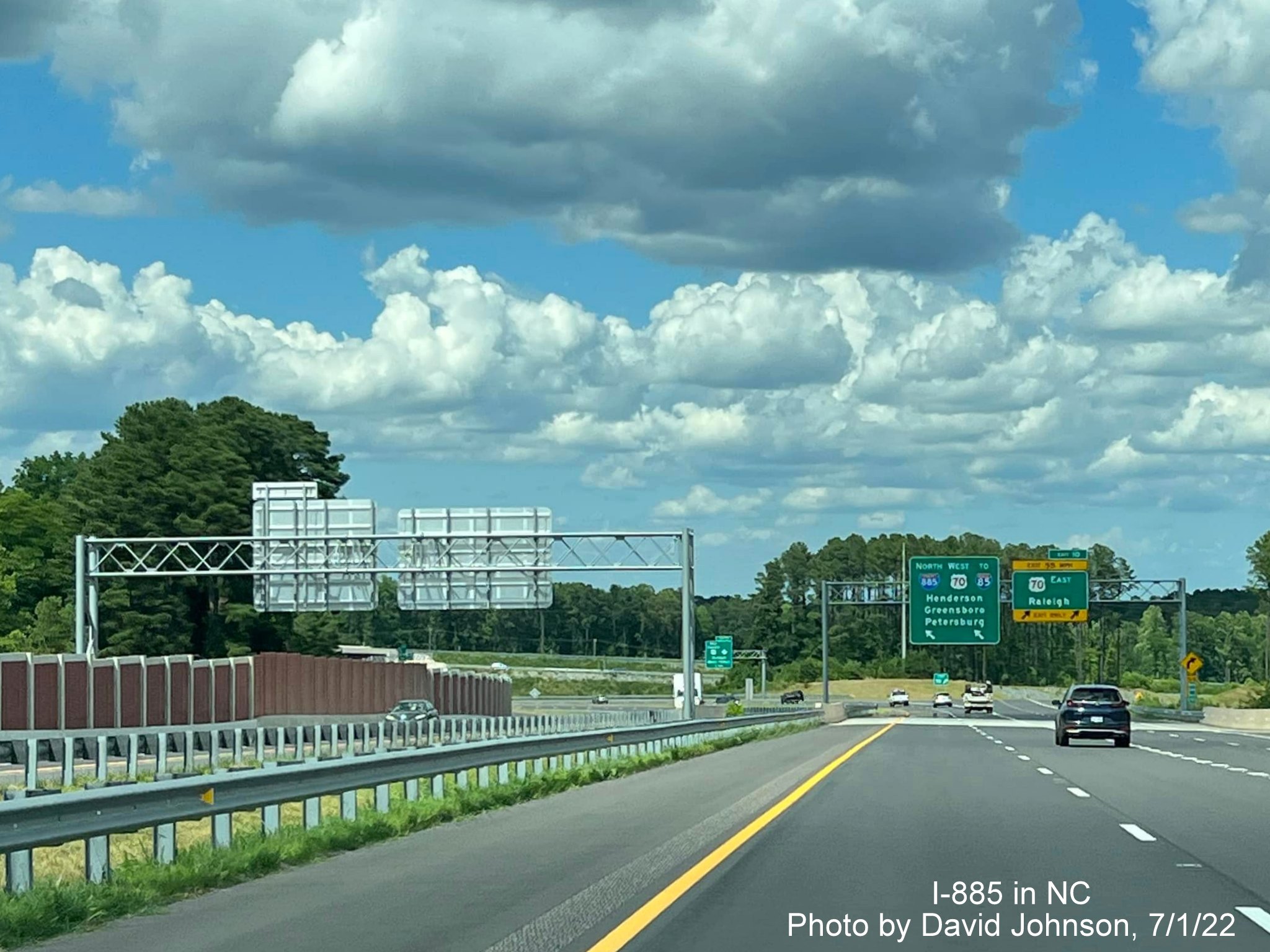 Image of overhead signage on I-885 North/East End Connector ramp at US 70 East exit, by David Johnson July 2022
