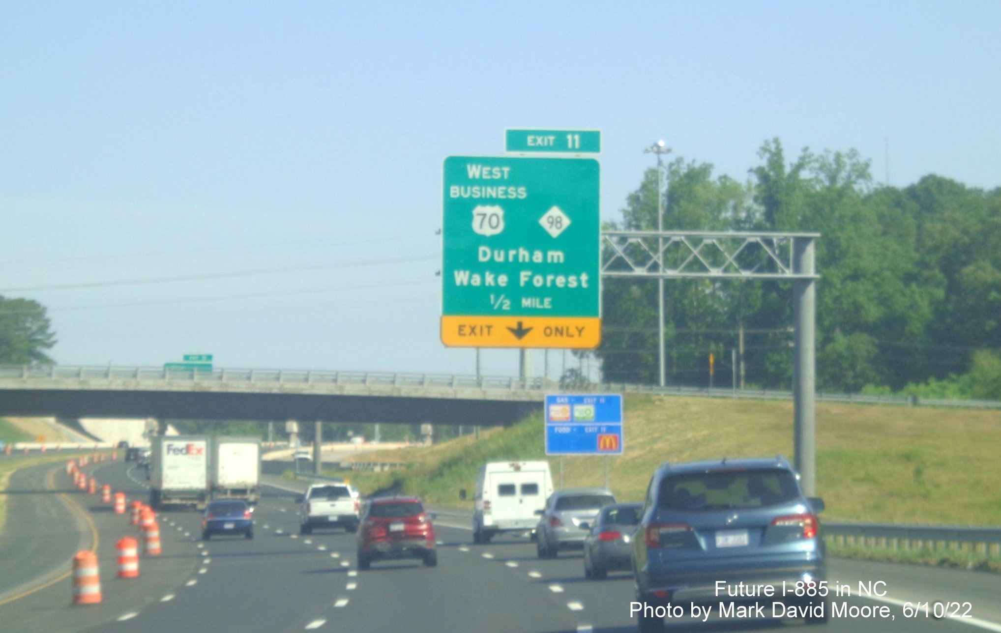 Image of 1/2 mile advance overhead sign for US 70 Business West/NC 98 exit
        on Future I-885 North/US 70 West in Durham, by Mark David Moore June 2022