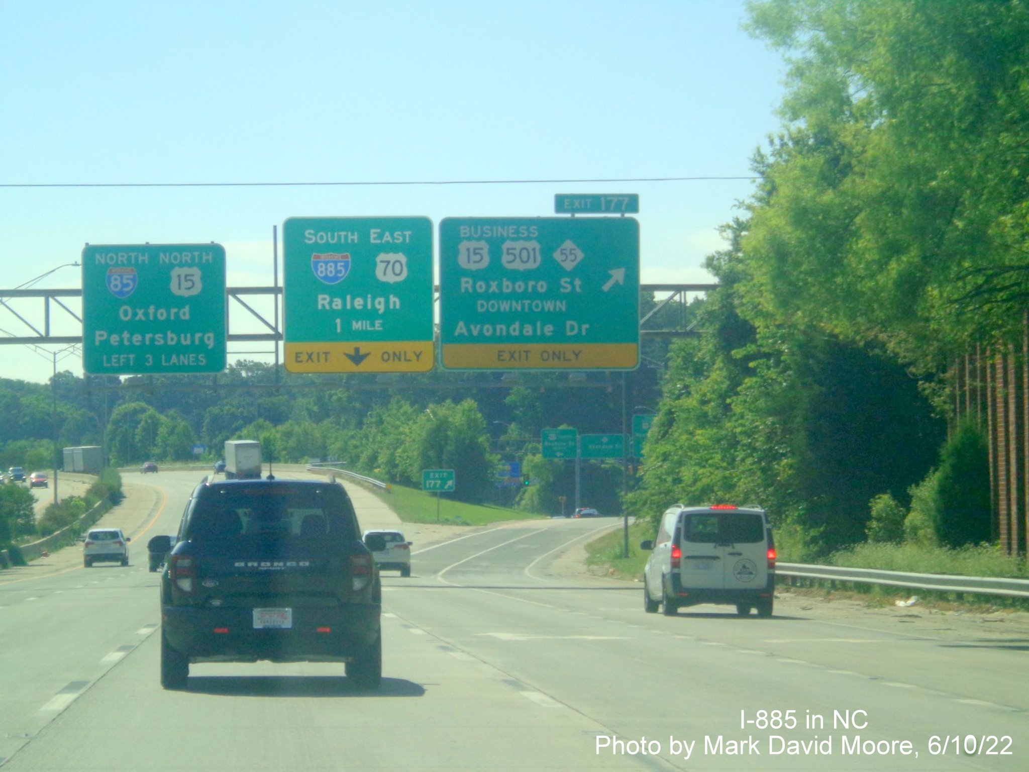 Image of 1 mile a advance overhead sign for new I-885 South/US 70 East exit
        on I-85 North/US 70 East in Durham, by Mark David Moore June 2022