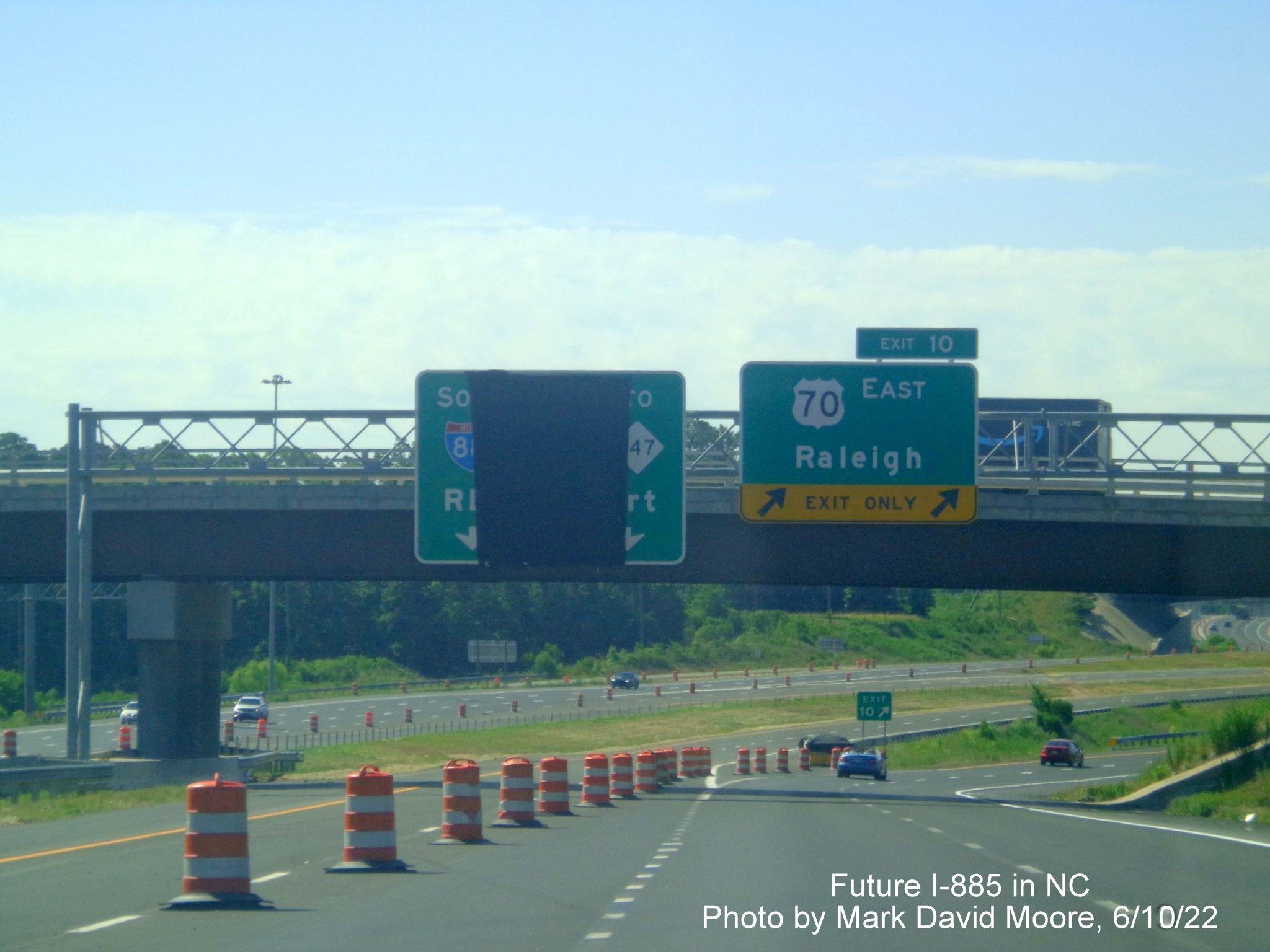 Image of new lane markings for Future I-885 South approaching US 70 East
        exit ramp in Durham, by Mark David Moore June 2022