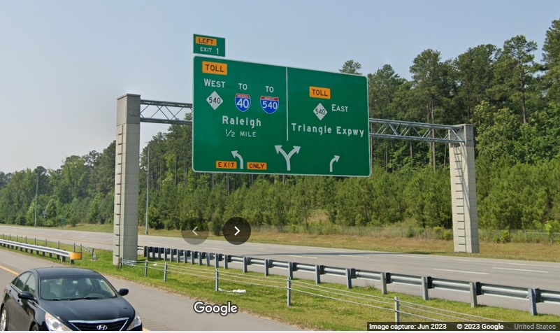 Image of 1/2 Mile advance arrow-per-lane sign for NC 540 West and East at end of NC 885 South Triangle Expressway in Research Triangle Park, Google Maps Street View, June 2023